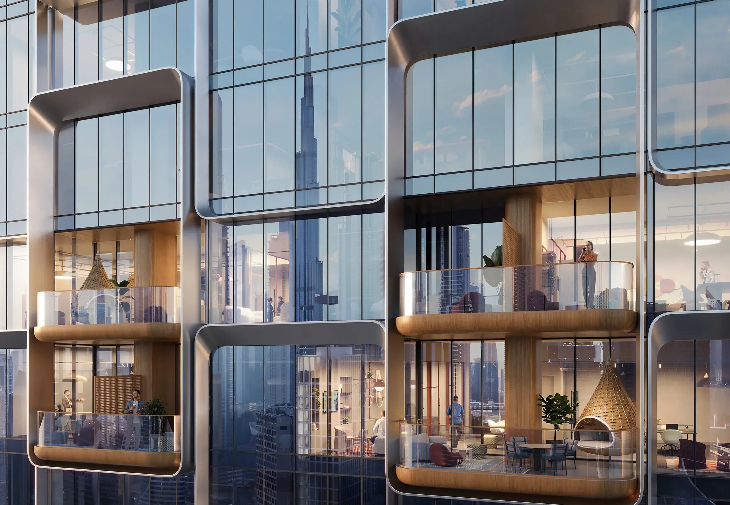 The tower façade — curved glass office pods with the Burj Khalifa reflected