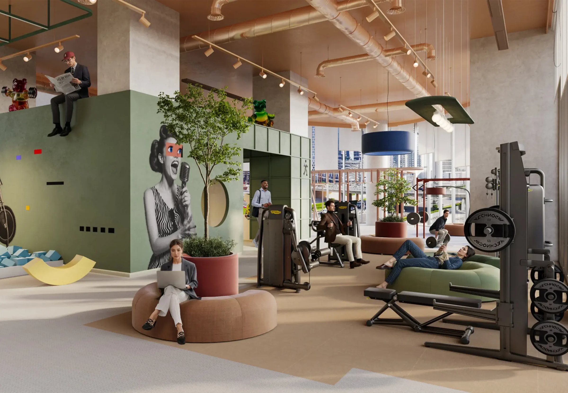The gym and play zone with a green mural wall