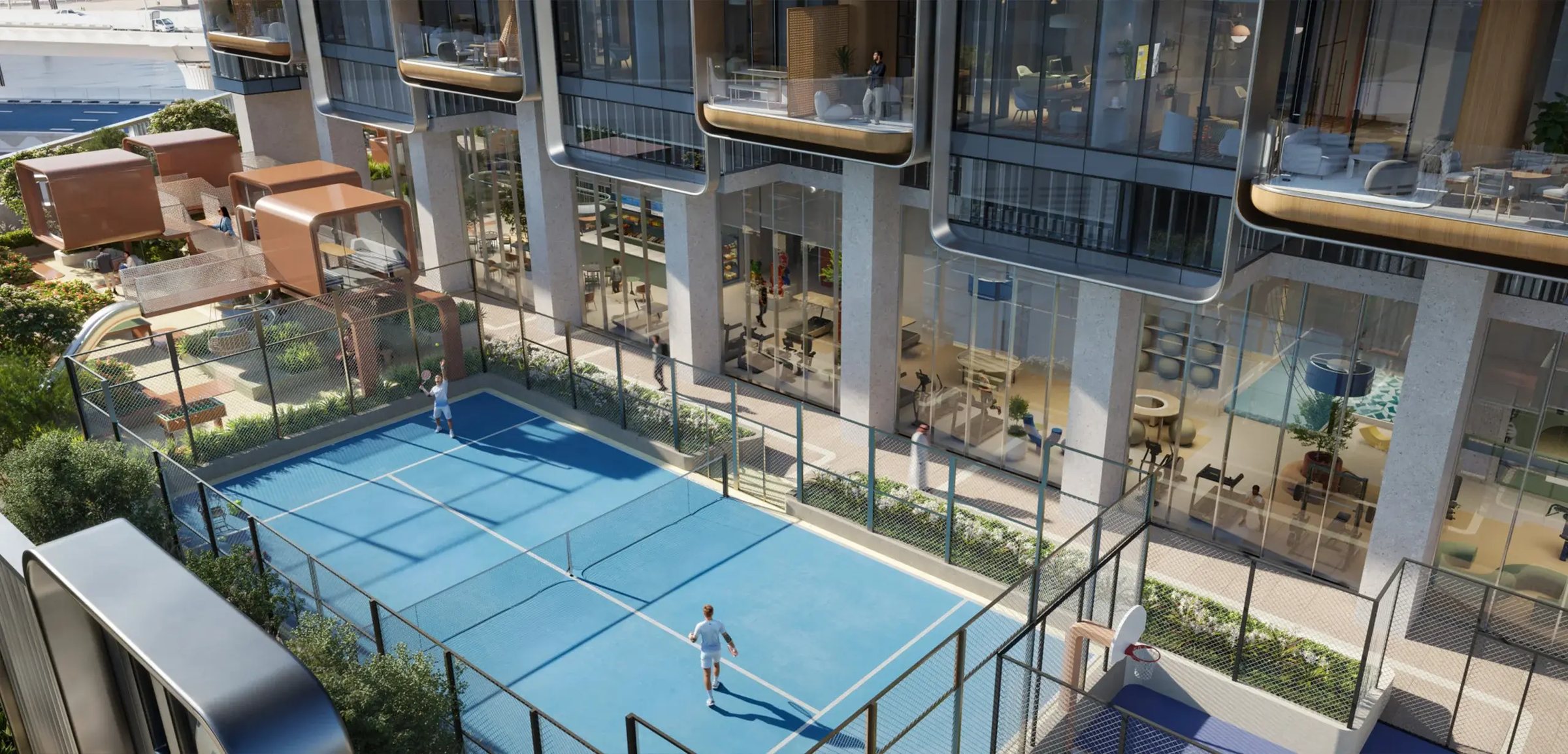 The rooftop padel court beside the glazed office floors