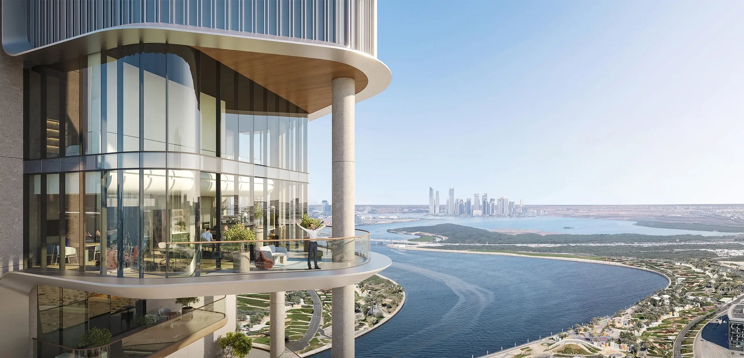 Curved glass pods high above the canal with the Business Bay skyline
