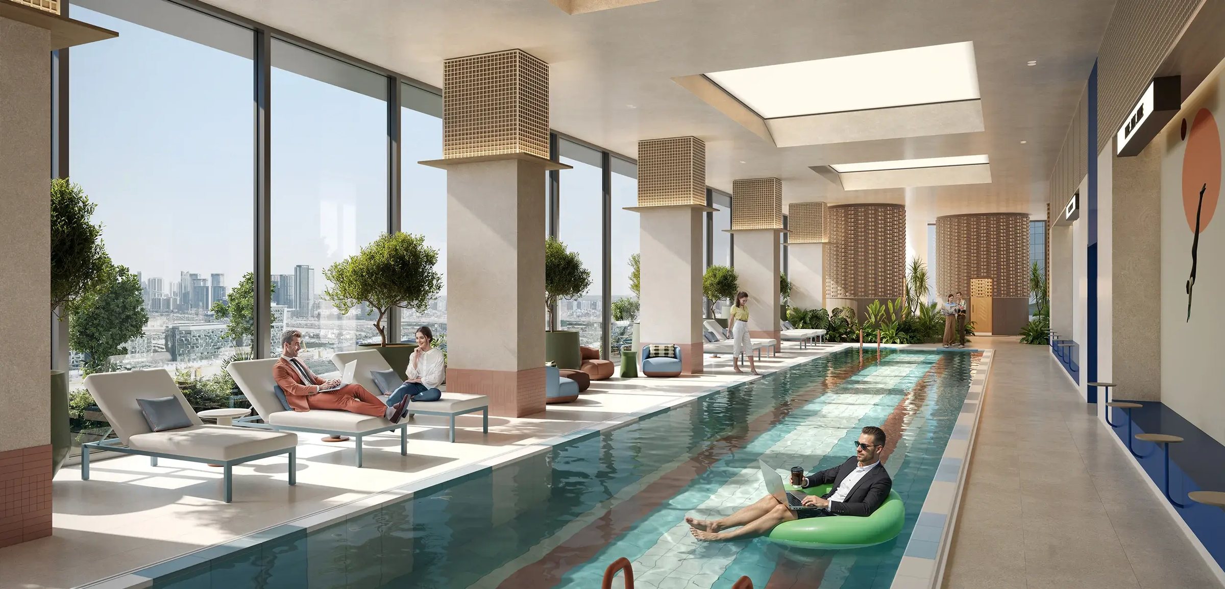 The 25-metre indoor pool with sun loungers along full-height glazing