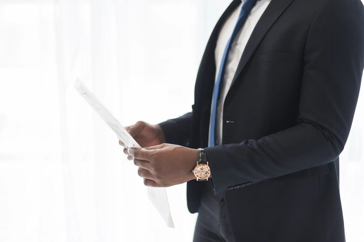 Advisor reviewing a proposal on a tablet