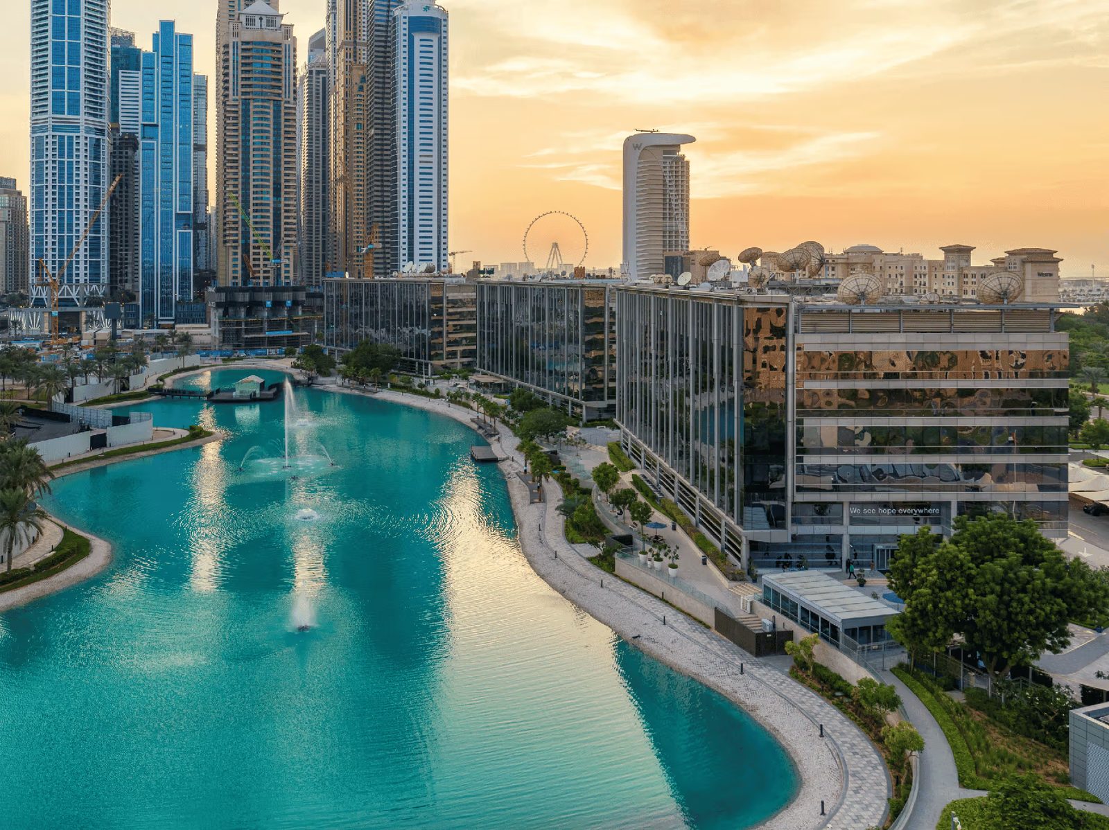 Dubai Media City lakeside offices at golden hour