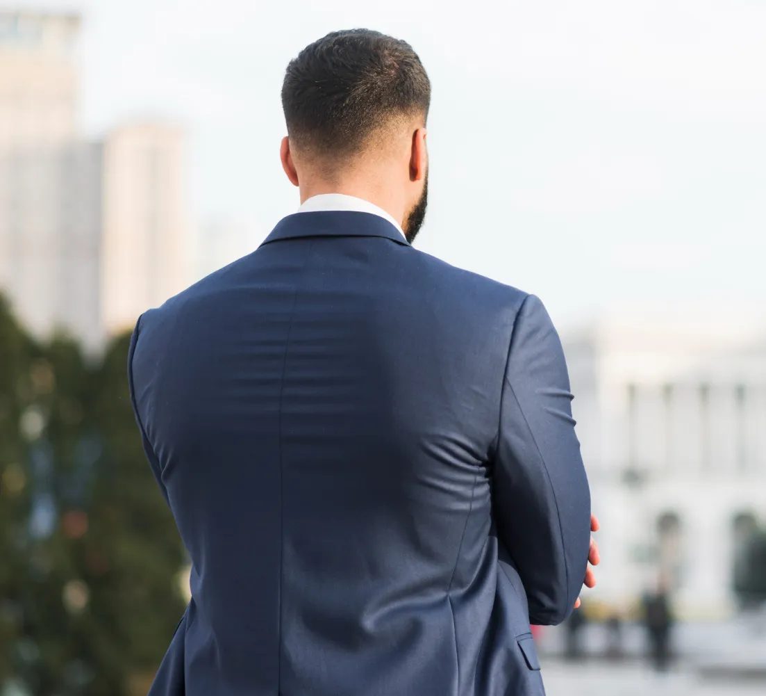 Investor looking out over the city skyline