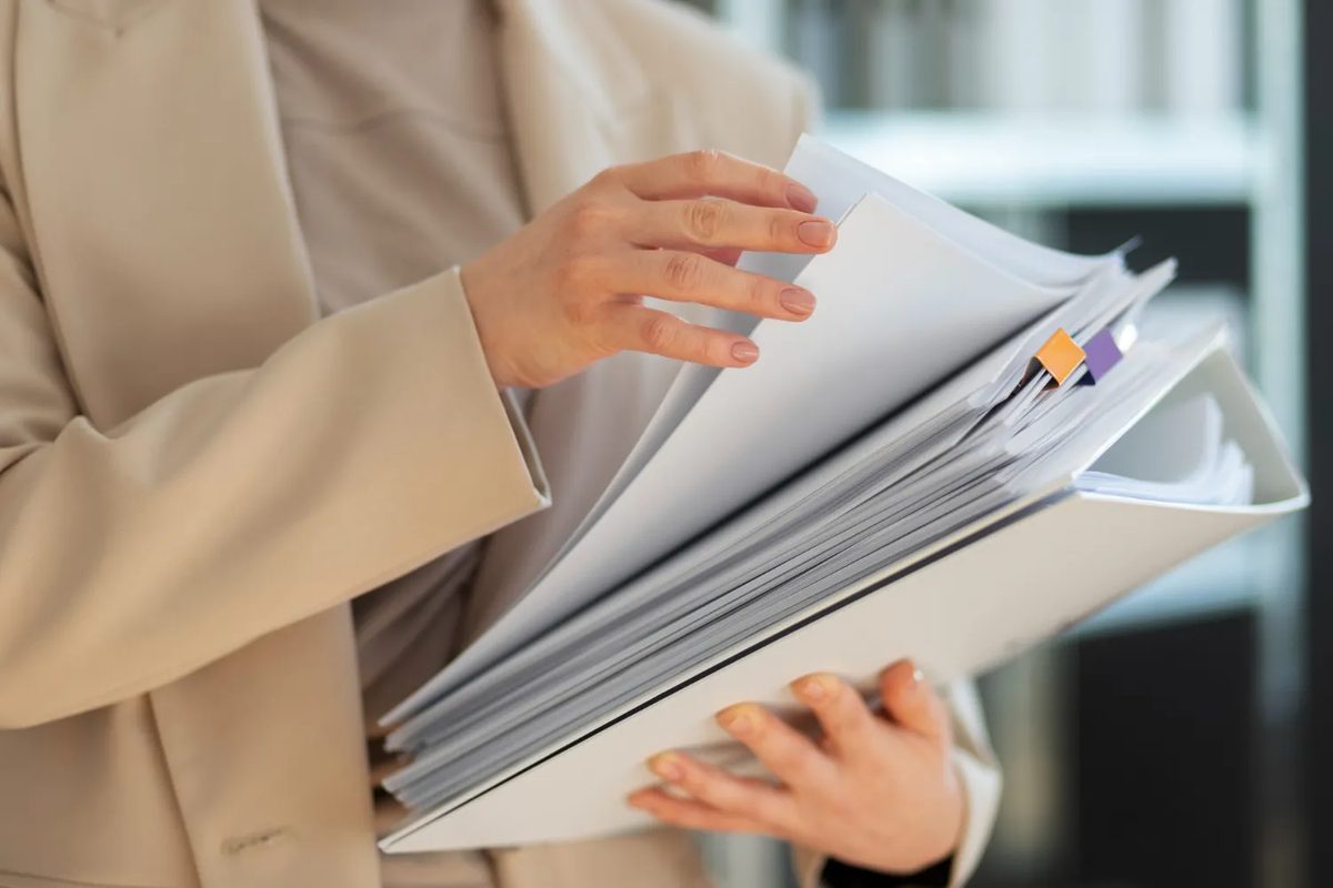 Advisor reviewing lease paperwork