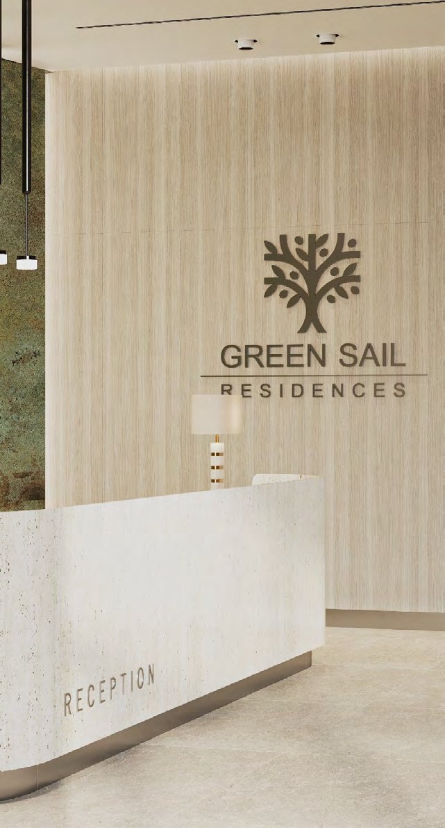 Reception lobby in travertine and timber with the Green Sail Residences mark on the wall