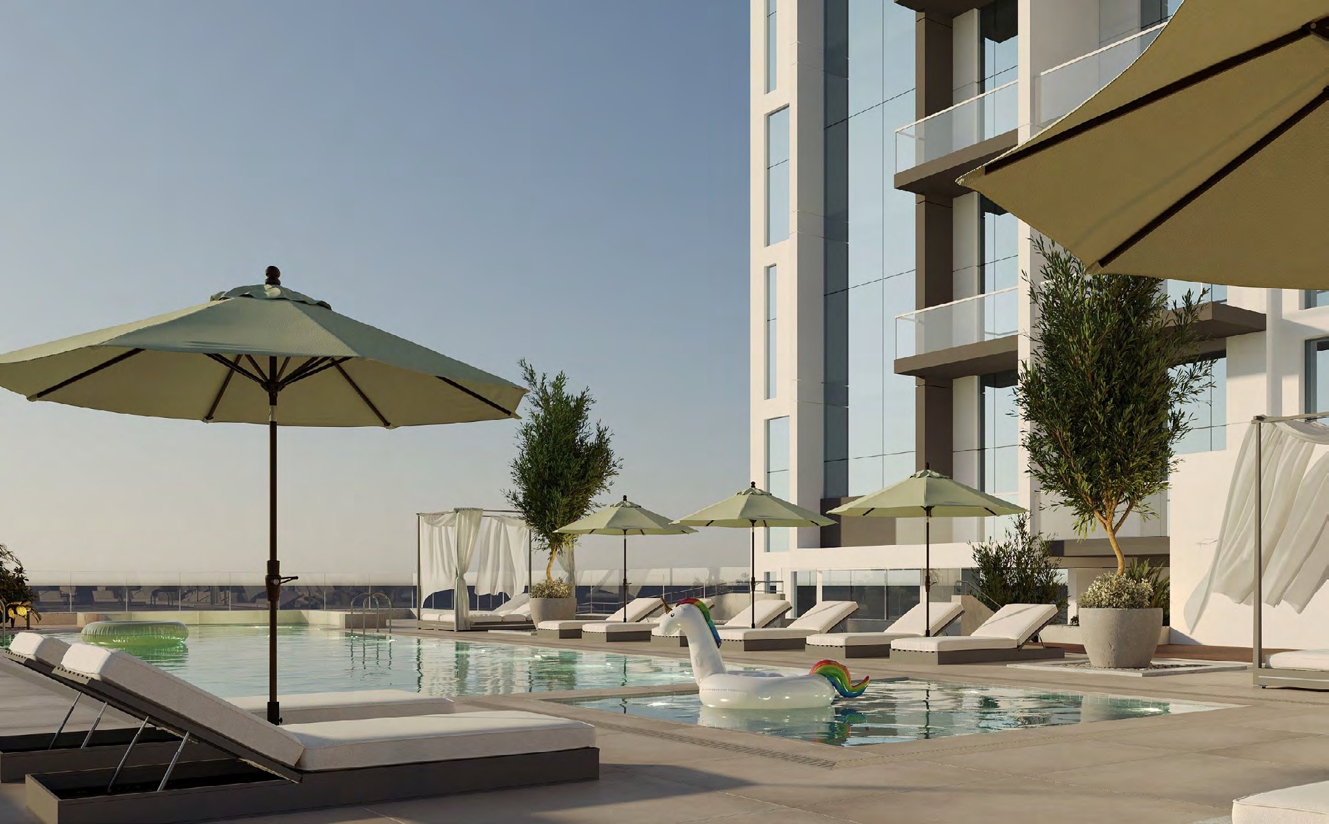 Rooftop swimming pool of Green Sail Residences with the tower rising behind