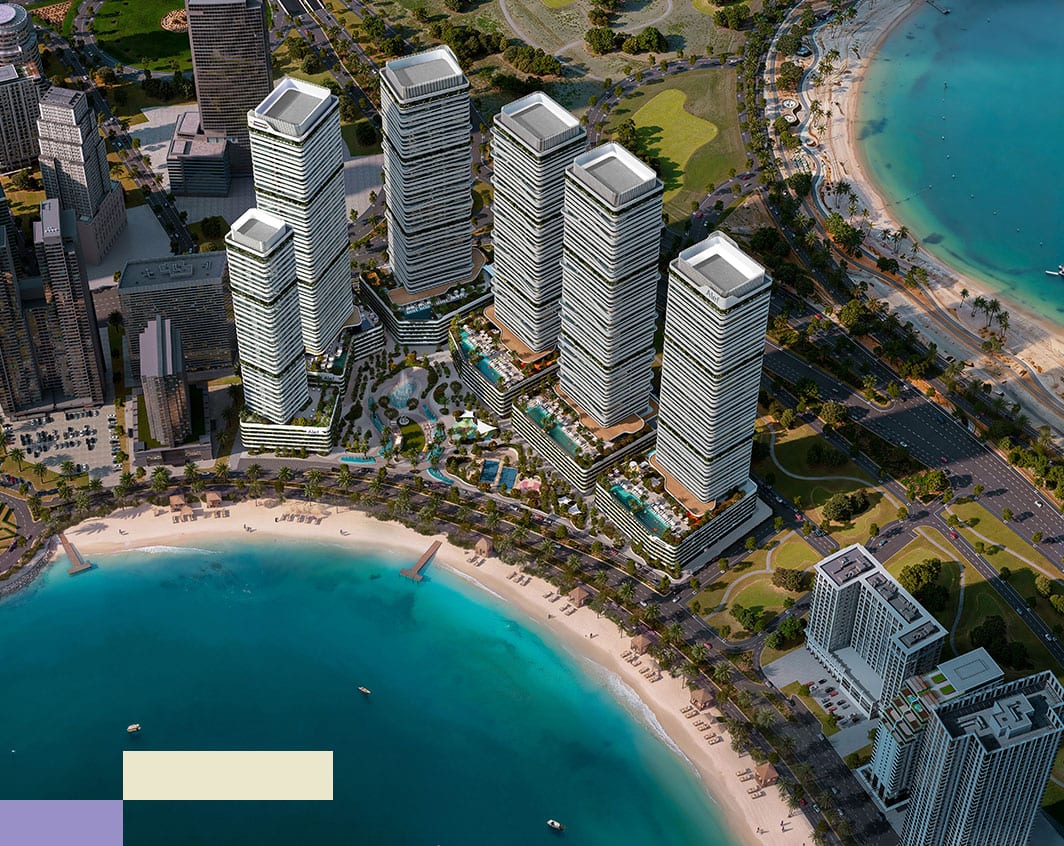 Aerial view of the six Linar towers rising behind Al Mamzar beach and its lagoon