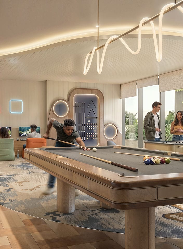 Teen recreation room with a pool table and games consoles