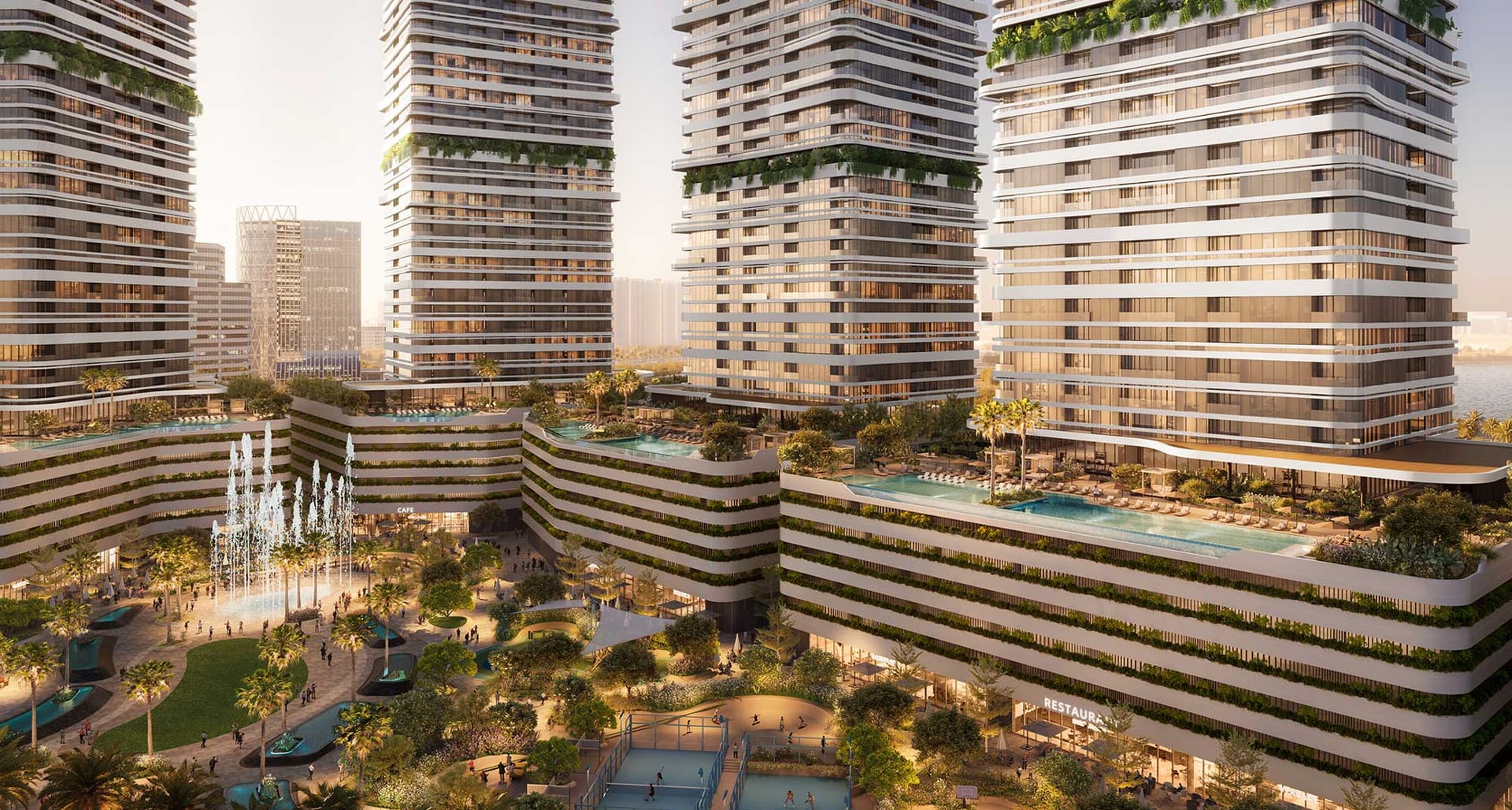 Aerial view of the podium sports courts and pools between the towers