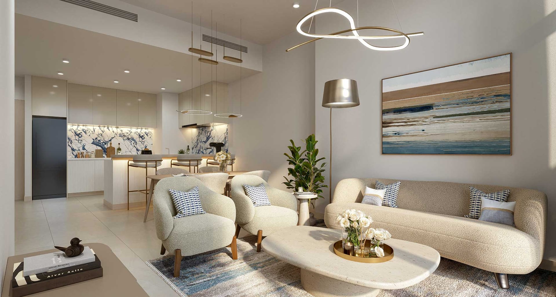 Living room in soft neutrals with a curved sofa